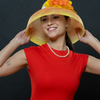 orange wide brim dress hat. Ladies sun hat