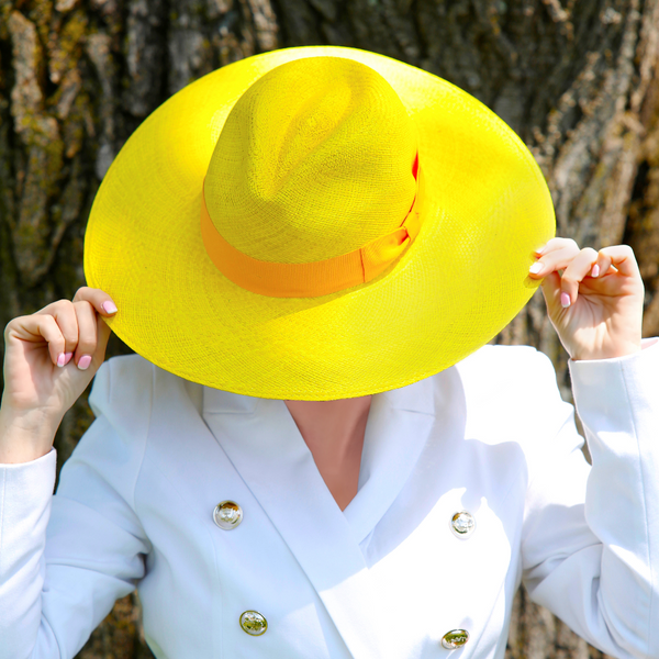 classy yellow Panama straw dress hat for women.